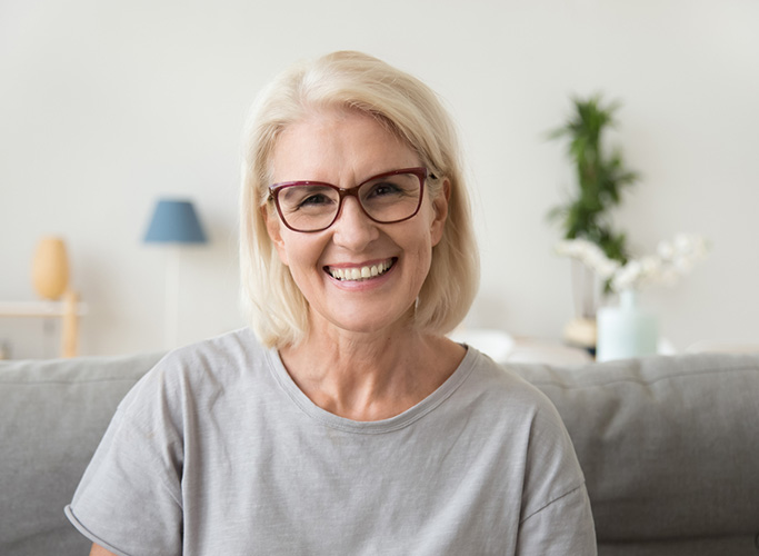 Smiling middle-aged mature grey haired woman